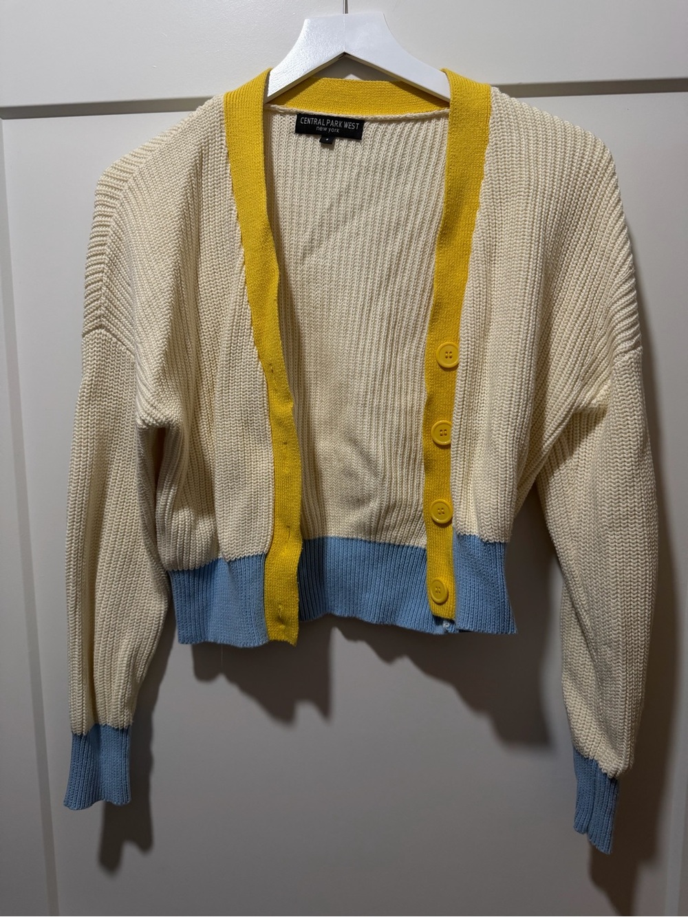 Central Park West Cream Cardigan with Yellow Trim and Light Blue Hem